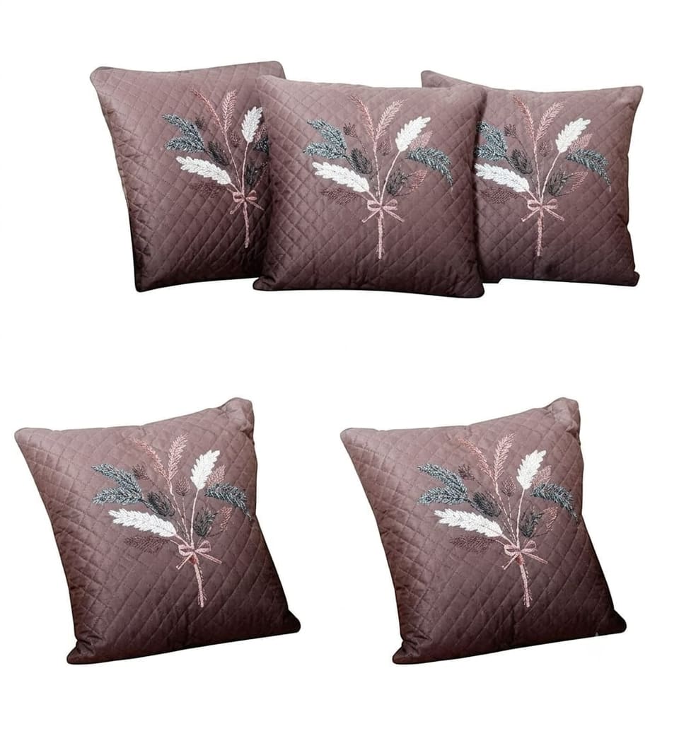 Mauve cushion covers with a feather print